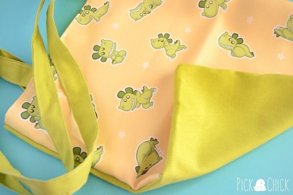 Totebag artesanal hecha a mano con estampado de dinosaurios y posturas de yoga